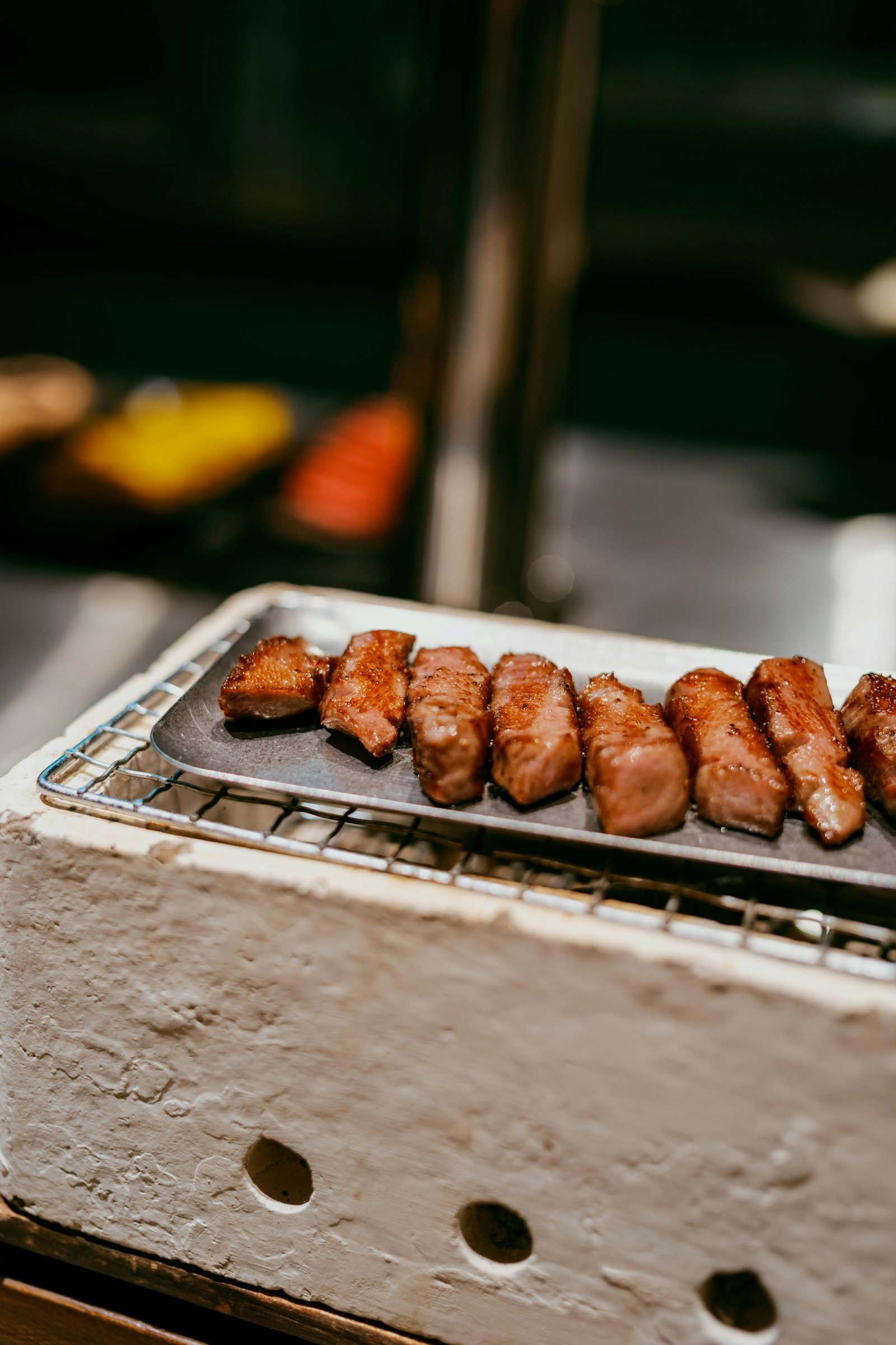 Binchotan-grilled pork skewers