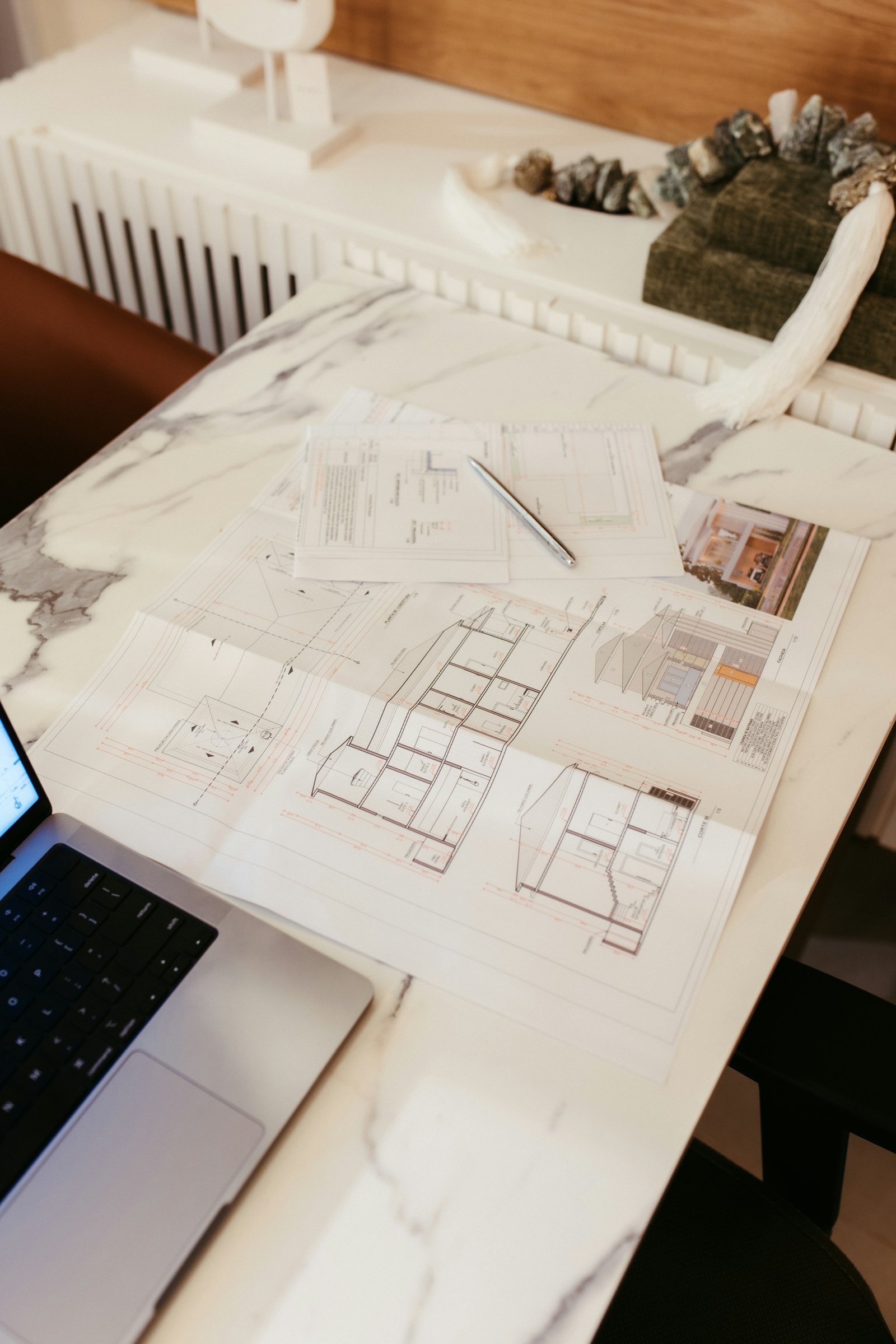 Architectural blueprints on a desk